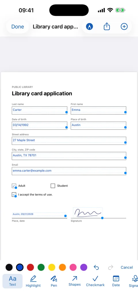 Filling in a photographed form: the text lands inside the boxes